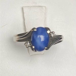 WHITE GOLD RING WITH STAR SAPPHIRE AND DIAMOND ACCENTS